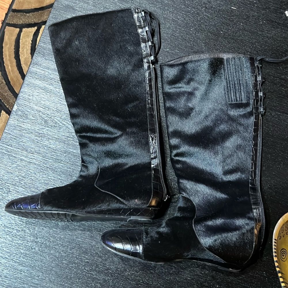 Women’s flat black suede boots